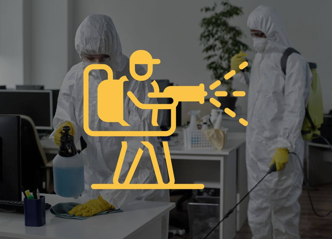Team in protective suits disinfecting an office space, highlighting Hellamaid USA’s thorough and expert disinfection services.