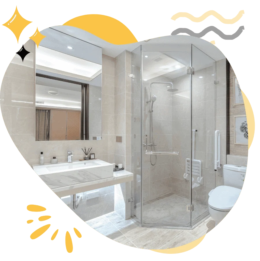 Professionally cleaned bathroom by Hellamaid, featuring a sparkling shower and pristine sink area. Trust Hellamaid to keep your home clean and shining with expert residential cleaning services.