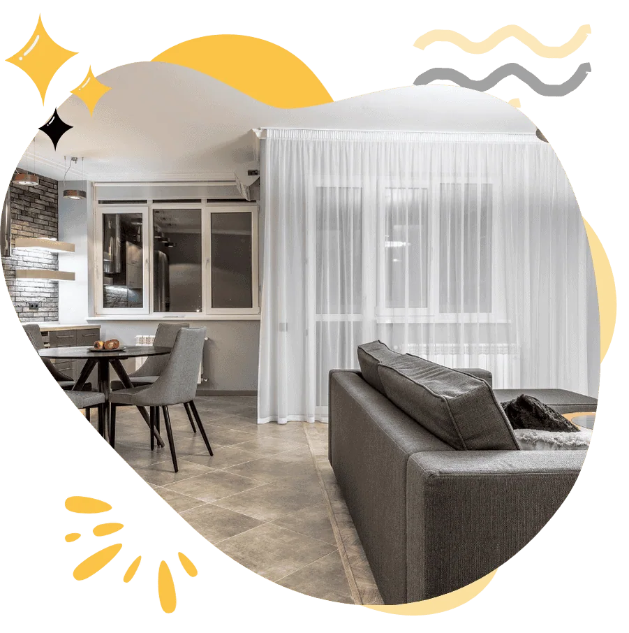 A clean and modern living room maintained by Hellamaid, showcasing a bright and fresh environment. Experience professional cleaning services for your entire home with Hellamaid