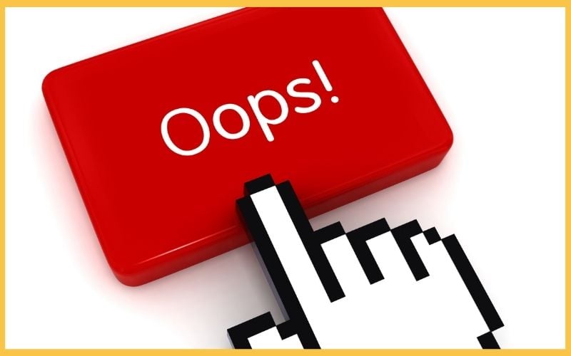 A red button labeled "Oops!" with a large cartoon hand cursor hovering above it.