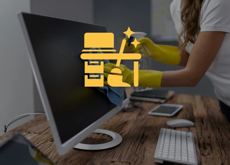 Office desk being cleaned by Hellamaid, providing professional office cleaning services throughout the USA.